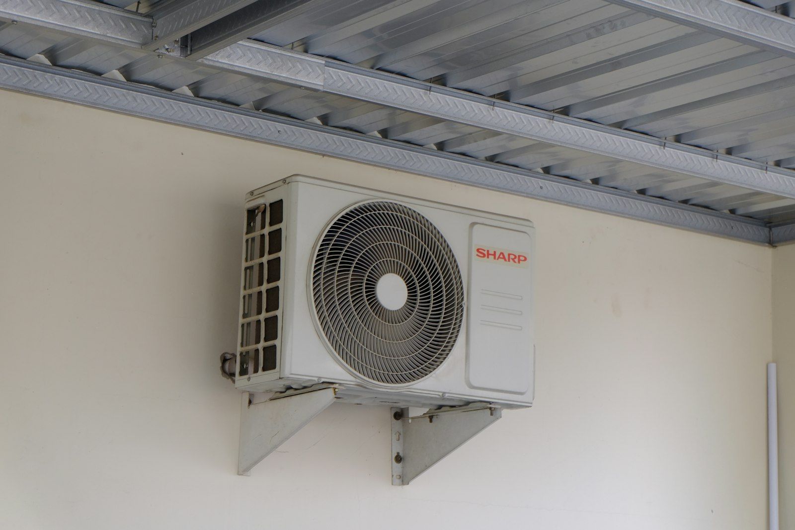 Outdoor AC unit on a wall bracket